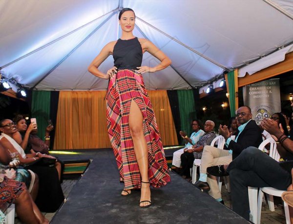 Ashley AnguinA woman who knows how to work a run way and does it so well. Former Miss Universe Jamaica Kaci Fennel-Shirley in a Courtney Washington design.