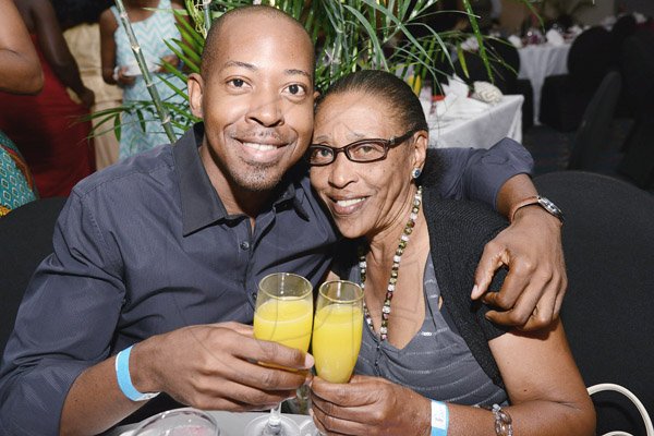 Rudolph Brown/Photographer<\n>Dino Limonious hugs his mother Dtheyn Limonious at the Jamaica Pegasus Hotel Mothers Day celebration brunch at Pegasus on Sunday, May 8, 2016<\n>
