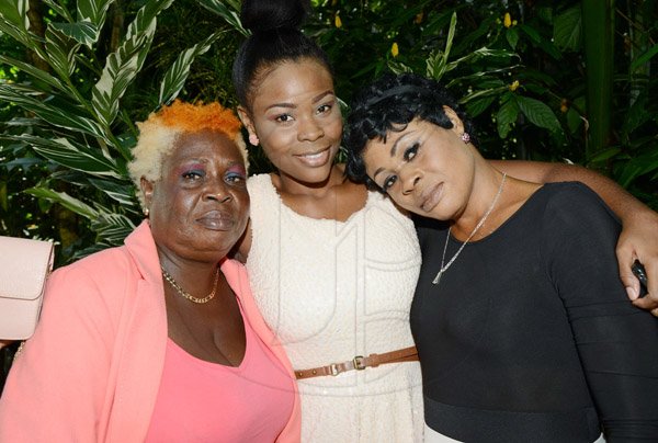 Rudolph Brown/Photographer
Judith Myrie, (centre) pose with her mother Shoreain Lewis, (right) and grandma Nervalyn Carty at the Boone Hall Oasis Mother Day brunch in Stony Hill on Sunday, May 11, 2014