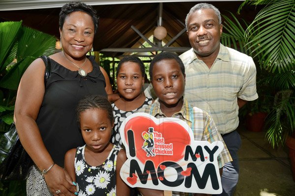 Rudolph Brown/Photographer
Dave and his wife Sophia Fairman pose with children from left Kelly, Kayla and Russell at the Boone Hall Oasis Mother Day brunch in Stony Hill on Sunday, May 11, 2014