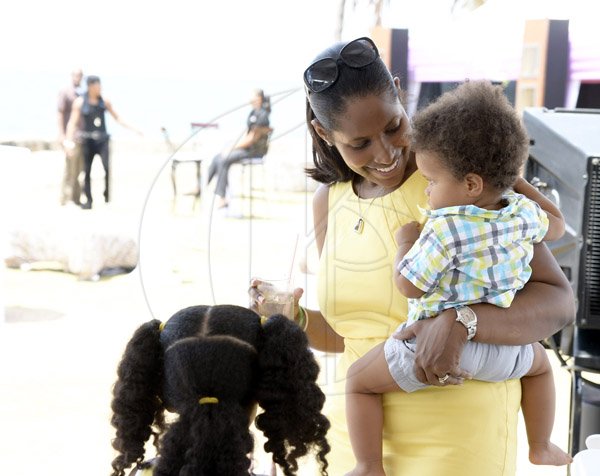 Gladstone Taylor / Photographer

Alesha Peart holding little Zayne Peart as seen at the mothers day brunch on the kingston waterfront