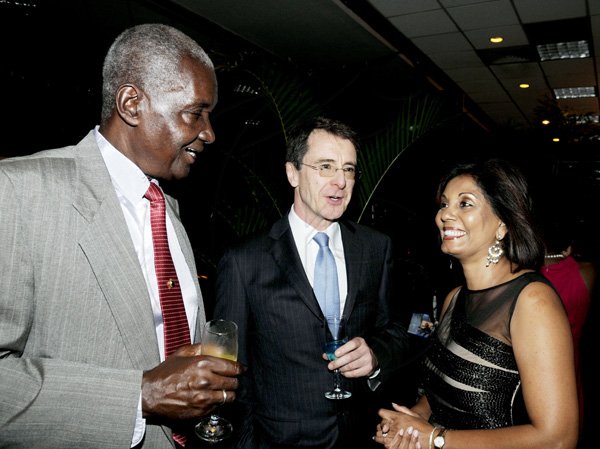 Winston Sill / Freelance Photographer
National Commercial Bank (NCB) 5th annual Nation Builder Wards Gala, held at the Jamaica Pegasus Hotel, New Kingston on Sunday night November 18, 2012. Here are Rex James (left); Chris Wain-Lowe (centre); and Bernadette Barrow (right).