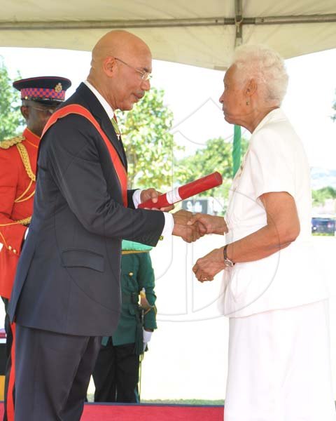 Jermaine Barnaby/Photographer
Heroes Day honourees at Kings House on Monday October 21, 2013.