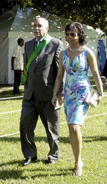 Ricardo Makyn/Staff Photographer.
Dapper duo Justice Ian Forte and wife Senator Marlene Malahoo-Forte were out enjoy the National Honours and Awards ceremony.




Ceremony of Investiture and presentation of National Awards 2010 at Kings House