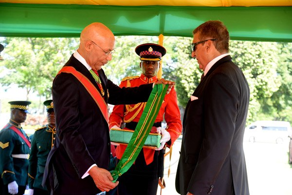 Lionel Rookwood/PhotographerPhillip Fredrick Gore recieves The Order Of Jamaica fron Governor General Sir Patrick Allen at The National Awards held at King's House on Monday October16th,2017.