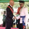 Lionel Rookwood/PhotographerGeorge Fitzroy Quallo recieves The Order Of Distinction in the rank of Commander fordistinguished service to the Jamaica Constabulary Force from Governor General Sir Patrick Allen at The National Honours and Awards Ceremony held at King's House on Monday October16th,2017. *** Local Caption *** Lionel Rookwood/PhotographerCommissioner of Police, George Fitzroy Quallo is all smiles as he receives The Order Of Distinction in the rank of Commander for distinguished service to the Jamaica Constabulary.