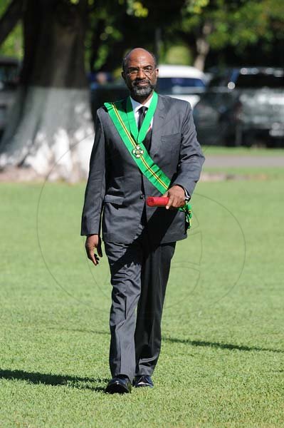 Lionel Rookwood/PhotographerEarl Jarrett walks back after recieving The Order of Jamaica during the National Awards and Honours held at King's House on October15th,2018