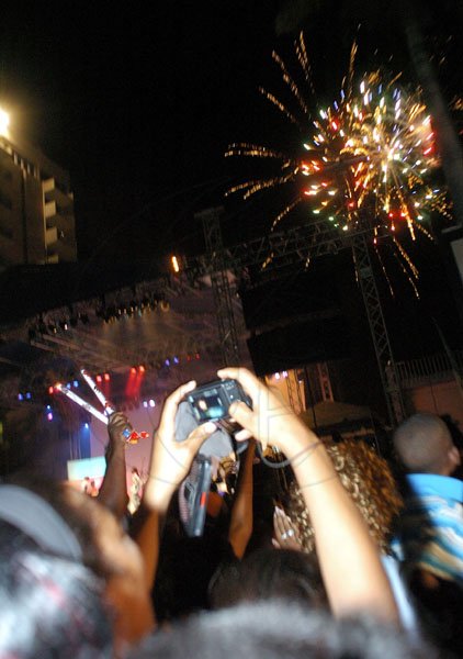 Ricardo Makyn/Staff Photographer.
Not only did people gazed at the fireworks but many attempted to capture the spactacle on their cellular phone and cameras.