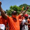 The crowd rush to Dr. Desmond Brennan, PNP candidate for Clarendon North Central, as he exited the Chapelton Family Court with his hands in the air at Main Street Chapelton, on August 18, 2020.