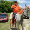 Riding a horse decorated in orange was Dr Desmond Brennan, PNP candidate for Clarendon North Central, from the vicinity of his constituency office on to Main Street Chapelton on August 18, 2020.
