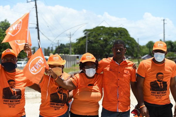 Kurt Matthews with his group of supporters outside the namination centre, St Catherine south central at the Seventh day adventist church, Old Harbour road.