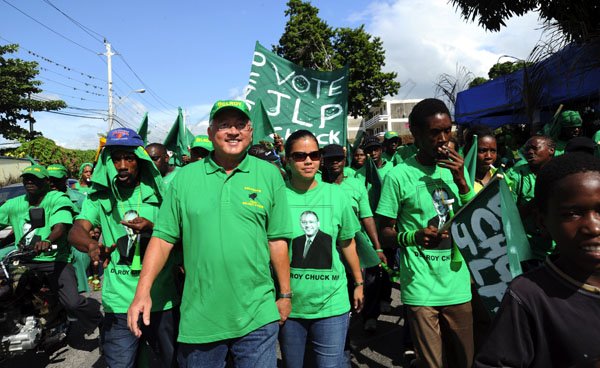 Norman Grindley/Chief Photographer
Delroy Chuck heading down Waterloo road to his nomination centre.