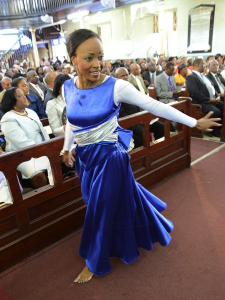 Rudolph Brown/Photographer
Karen Selmoe Johnson dancing at the service of thanksgiving for the 140th Anniversary of the City of Kingston and The Achievements of the London 2012 Olympians and Paralympians " Repairing the Breach, Restoring the Treasure" at the East Queen Street Baptist Church on East Queen Street in Kingston on Sunday, October 14, 2012