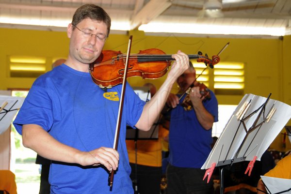 Gladstone Taylor / Photographer

Royal Philharmonic Orchestra visits Alpha boys home yesterday morning