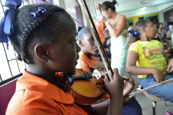 Rudolph Brown/Photographer
Royal Philgarmonic Orchestra Workshop at Kingston College in Kingston on Wednesday, September 12-2012