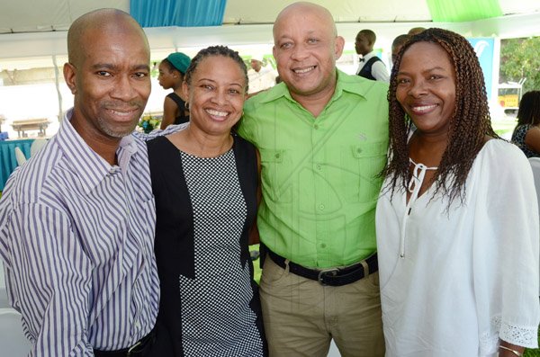 Rudolph Brown/Photographer
Dionne Jackson Miller,(second left)  President of PAJ pose with from left Wayne Brown, Mark Chisholm, (left) Vice President individual Line sales and The Gleaner's  Advertising and Operations Manager Nordia Craig at the PAJ President's brunch at the Pegasus Hotel on Sunday, November 23, 2014