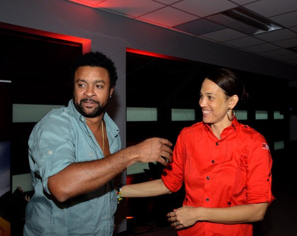 Winston Sill/Freelance Photographer
Pandemonium Welcome Reception for Machel Montano, held at J. wray and Nephew Head Office, Dominica Drive, New Kingston on Tuesday night April 22, 2014. Here are Shaggy (left); and Tamara Harding (right).