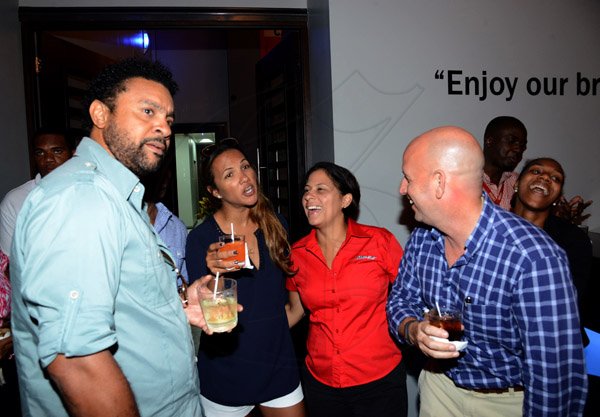Winston Sill/Freelance Photographer
Pandemonium Welcome Reception for Machel Montano, held at J. wray and Nephew Head Office, Dominica Drive, New Kingston on Tuesday night April 22, 2014. Here are Shaggy (left); Rebecca Packer (second left); Tina Matalon (seond right); and Gary Matalon (right).