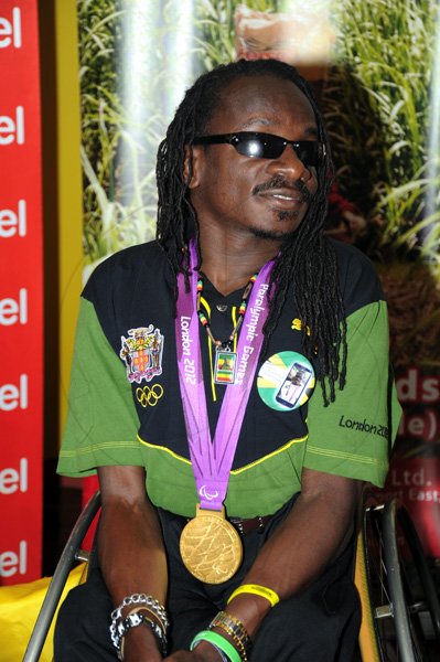 Norman Grindley/Chief Photographer
The Jamaica paralympic Association team arrives at the Norman international airport in Kingston yesterday.