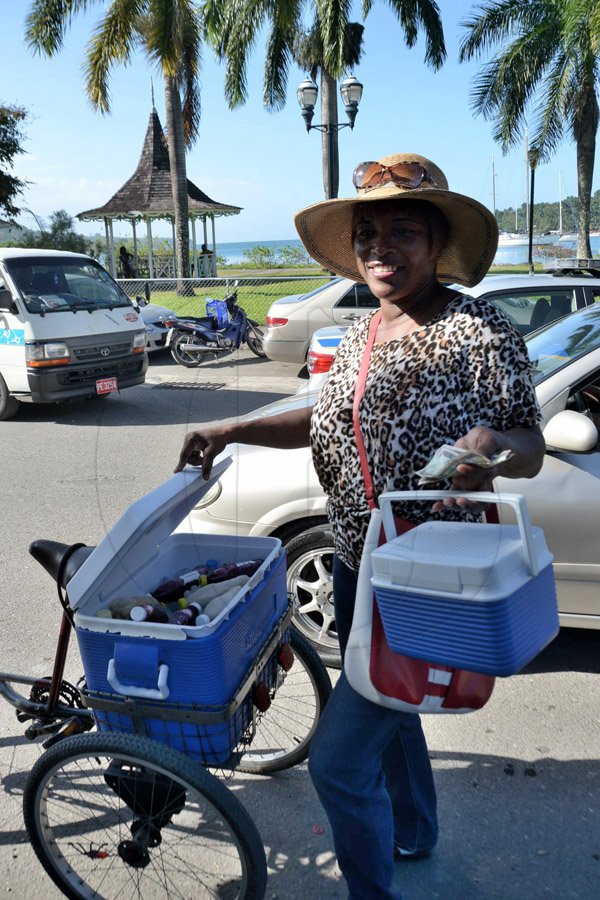 Ian Allen/Staff Photographer
Marcia Doyley(Juicy Peaches) selling her juices in the Port Antonio Marina.