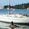 Ian Allen/Staff Photographer
Clive Black riding on his Raft beside a Yacht in Port Antonio Marina.