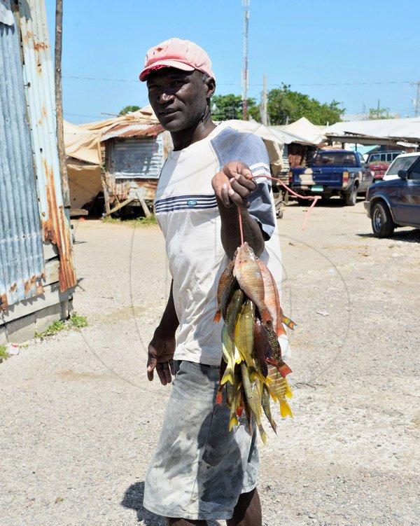 Ian Allen/Staff Photographer
Norbert Fenton, Fish Vendor in Sav.