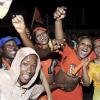 Norman Grindley/Chief Photographer
Supporters of the People's National  Party celebrate  at the office of Portia Simpson Miller's constituency office  on Waltham Park Road in South West St Andrew after the PNP's victory last night.