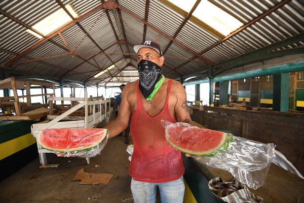Euton Lord market vendor spekaing with the Star  in the Metcalfe market, Annotto Bay, St Mary where there is currently a quarantine due to an outbreak of Covid-19 in the community.