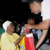 JIS/Photograph                                                                                                                                                                        Pics from PM?s Treats                                                                                                                                                             Prime Minister Andrew Holness presents a special gift to 100-year-old Gladys Mae Murray, who was among hundreds of guests at his treat for golden agers from his West Central St. Andrew constituency at the Olympic Gardens community centre, Olympic Way on Saturday, December 24.