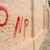 Tivoli residents protest PNP graffiti on walls