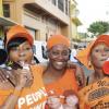 Ian Allen/Photographer 
PNP supporters in Mandeville in Manchester on Sunday.