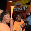 Jermaine Barnaby/Photographer
A PNP supporters blowin a vuvuzela at the rally in Black River, St. Elizabeth on Sunday November 22, 2015.
