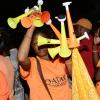Jermaine Barnaby/Photographer
A vendor selling vuvuzela at the PNP rally in Black River, St. Elizabeth on Sunday November 22, 2015.