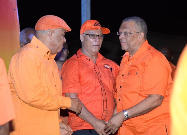 Jermaine Barnaby/Photographer
Robert Pickersgill (left) Evon Redman (center) and Peter Phillips at the PNP rally in Black River, St. Elizabeth on Sunday November 22, 2015.