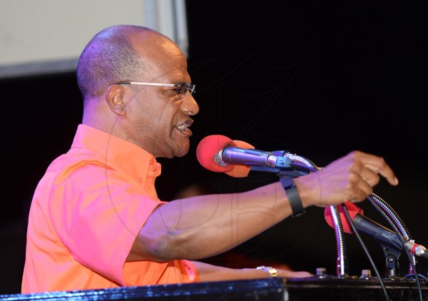 Jermaine Barnaby/Photographer
Peter Bunting at the podium at the PNP rally in Black River, St. Elizabeth on Sunday November 22, 2015.