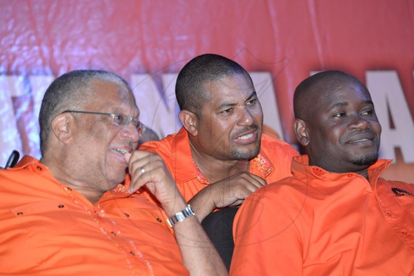 Jermaine Barnaby/Photographer
Peter Phillis (left) Mikael Phillips at the PNP rally in Black River, St. Elizabeth on Sunday November 22, 2015.