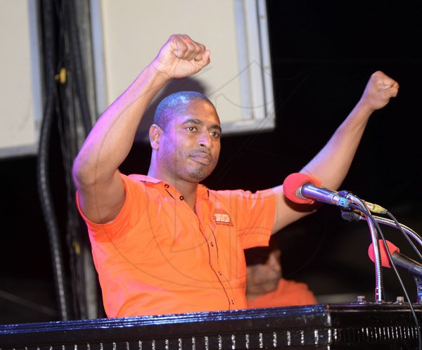 Jermaine Barnaby/Photographer
Hugh BUCHANAN AT THE PODIUM AT THE PNP rally in Black River, St. Elizabeth on Sunday November 22, 2015.