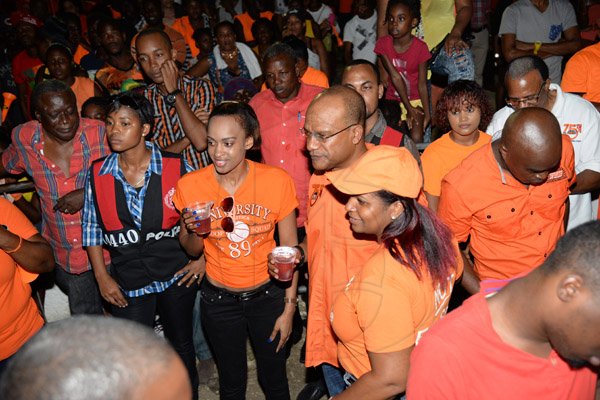 Jermaine Barnaby/Photographer
Peter Bunting among a throng of supporters at the PNP rally in Black River, St. Elizabeth on Sunday November 22, 2015.