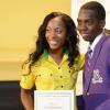 Rudolph Brown/Photographer
Double Olympic Sprint Champion Shelly-Ann Fraser Pryce,  Chairperson of the Pocket Rocket Foundation presents scholarship to Jovaine Atkinson of Kingston College at the Pocket Rocket Foundation scholarship to them at the presentation ceremony at Devon House on Tuesday, September 17, 2013
