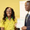 Rudolph Brown/Photographer
Double Olympic Sprint Champion Shelly-Ann Fraser Pryce, Chairperson of the Pocket Rocket Foundation presents scholarship to Carlton Collins of Munro College at the Pocket Rocket Foundation scholarship to them at the presentation ceremony at Devon House on Tuesday, September 17, 2013