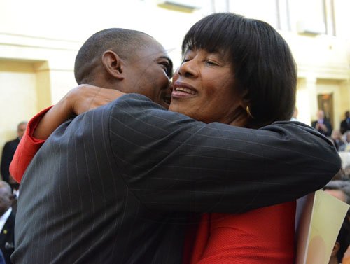 Rudolph Brown/Photographer
Governor General Sir Patrick Allen swearing the Portia Simpson Miller cabinet ministers at Kingston House on Friday, January 6-2012