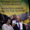 Jermaine Barnaby/Photographer
Prime Minister Portia Simpson Miller (left) and Opposition Leader Andrew Holness jointly light a candle as a symbol for national unity at the annual National Leadership Prayer Breakfast at the  Jamaica Pegasus Hotel in New Kingston on Thursday, January 21, 2016. At center is His Excellency, Governor-General Sir Patrick Allen.