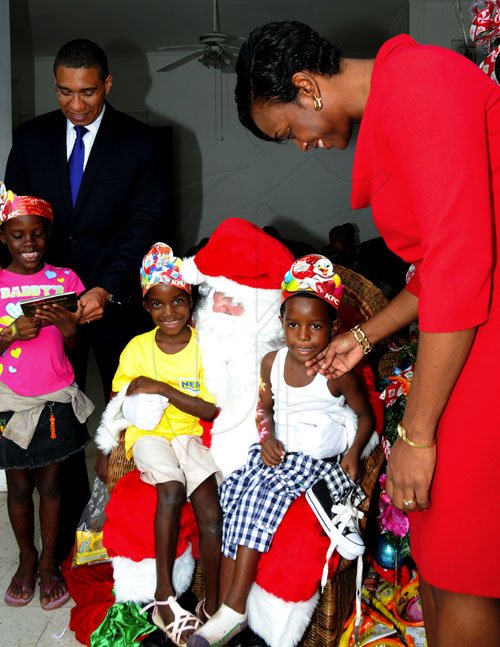 Winston Sill / Freelance Photographer
Prime Minister Andrew Holness and wife Juliet host Children Christmas Treat, held at Vale Royal, St. Andrew on Wednesday December 14, 2011.