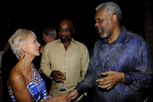 Winston Sill / Freelance Photographer
The Portia Simpson-Miller Foundation annual Scholarship Award Fundraising Party, held at Norbrook Drive, on Friday night November 16, 2012. Here are Kelly Tomblin (left); Lloyd  Tomlinson (centre); and Errald Miller (right).