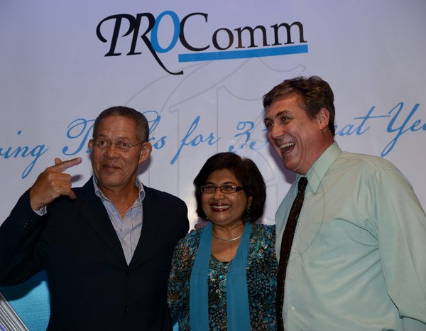 Winston Sill/Freelance Photographer
PRO Com 35th Anniversary Clients and Media Reception, held at the Jamaica Pegasus Hotel, New Kingston on Wednesday night December 4, 2013. Here are former Prime Minister Bruce Golding (left); Jean Lowrie-Chin (centre); and Barry O'Brien (right), CEO, Digicel, all celebrating birthday.