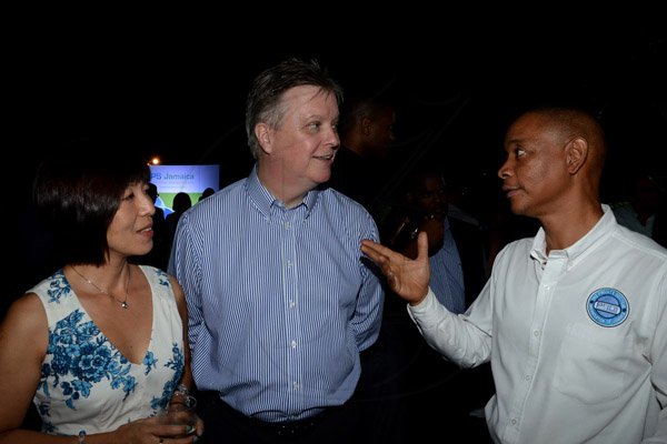 Winston Sill/freelance Photographer
BUSINESS DESK:-----The Private Sector Organisation of Jamaica (PSOJ) host Members Mingle, held at the British High Commission, Trafalgar Road on Wednesday night November 5, 2014.  Here are Hisae Fitton (left); David Fitton (centre), British High Commissioner; and Dennis Chung (right), CEO, PSOJ.