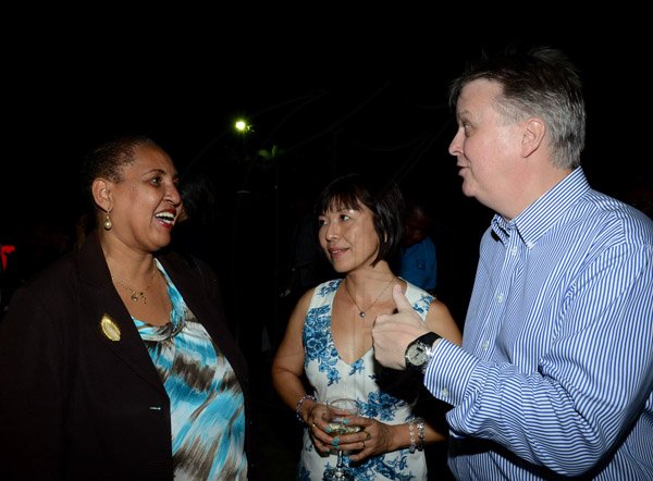 Winston Sill/freelance Photographer
BUSINESS DESK:-----The Private Sector Organisation of Jamaica (PSOJ) host Members Mingle, held at the British High Commission, Trafalgar Road on Wednesday night November 5, 2014. Here are Greta Bouges (left); Hisae Fitton (centre); and David Fitton (right), British High Commissioner.