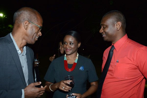 Winston Sill/freelance Photographer
BUSINESS DESK:-----The Private Sector Organisation of Jamaica (PSOJ) host Members Mingle, held at the British High Commission, Trafalgar Road on Wednesday night November 5, 2014. Here are Clement "Jimmy" Lawrence (left), Managing Director, J Wray and Nephew; Shanique Anderson (centre), Mayberry Executive; and Dwayne Tulloch (right), Customer Care Director, Digicel.