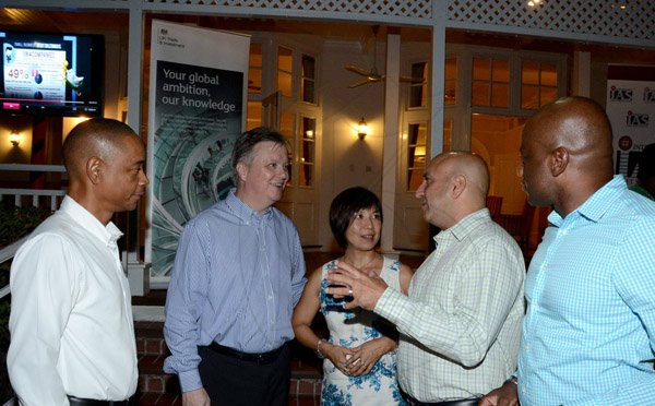 Winston Sill/freelance Photographer
BUSINESS DESK:-----The Private Sector Organisation of Jamaica (PSOJ) host Members Mingle, held at the British High Commission, Trafalgar Road on Wednesday night November 5, 2014. Here are Dennis Chung (left), CEO, PSOJ; British High Commissioner David Fitton (second left); Hisae Fitton (centre); Christopher Zacca (second right), President, PSOJ; and Elon Parkinson (right), LIME, Jamaica.