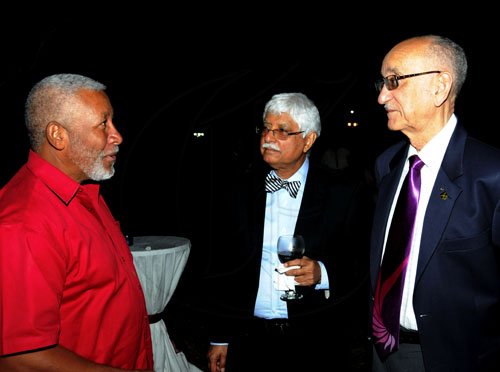 Winston Sill / Freelance Photographer
Former army and police chief Rear Admiral (ret.) Hardley Lewin (left) chats with Office of Utilities Regulation boss Zia Mian (centre) and sports administrator Mike Fennell.


The High Commissioner of India Mohinder Grover and wife Vardeep Grover host reception on the occasion of the 63rd Republic Day of India, held at India House, East Kings House Road on Thursday January 26, 2012.